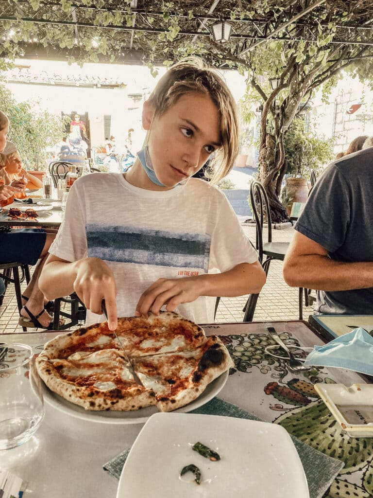 eating pizza in italy food travel